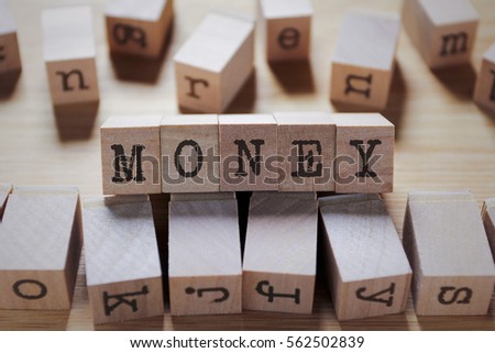 Money Word In Wooden Cube
