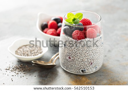 Healthy vanilla chia pudding in a glass with fresh berries Royalty-Free Stock Photo #562510153