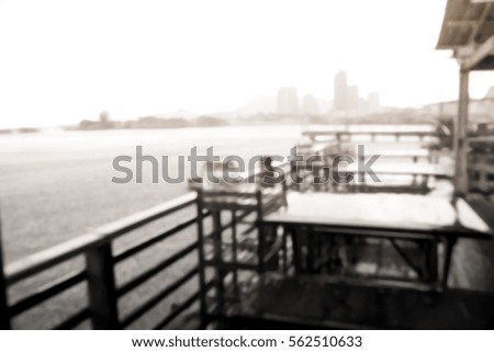 Picture blurred for background abstract and can be illustration to article of table in restaurant near sea