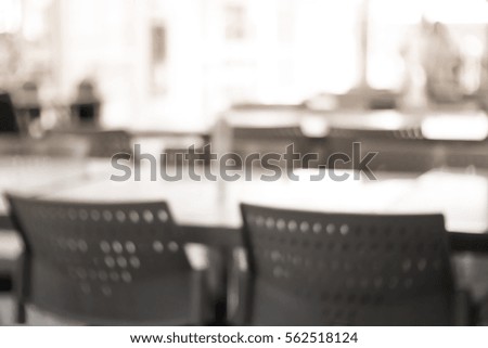 Blurred background abstract and can be illustration to article of Tables and chairs on food court