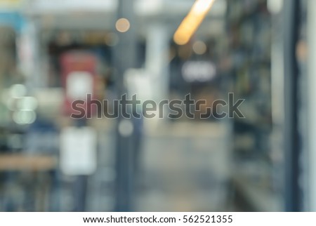Blurred image of bookstore or cafe background Royalty-Free Stock Photo #562521355
