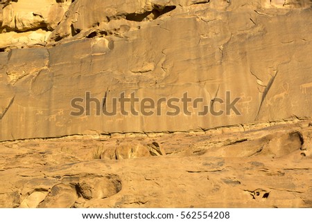 Rock carvings on rocks in the desert of Wadi Rum