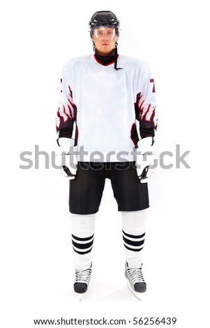 Portrait of healthy sportsman in hockey uniform in studio