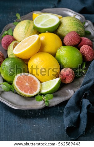 Variety of citrus fruits with tiger lemon