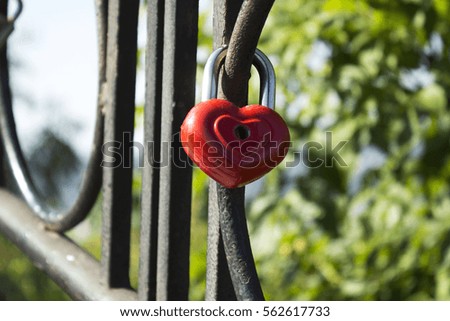 lock for keys in the form of heart hanging on the fence, love, Valentine's day