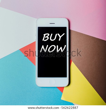 BUY NOW text on smartphone screen
