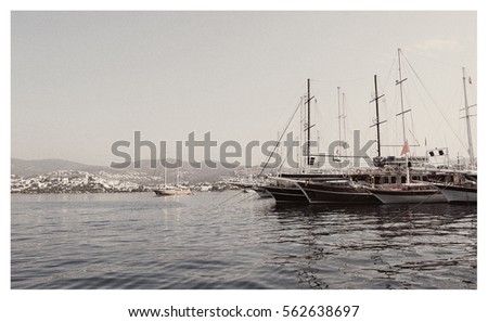 Amazing vintage. Beautiful seascape. Boats on a sea background. Seascape. Sweet memories. Travel and vacation. Marine style. Stunning view. Black White photography. Retro postcard. Creative artwork