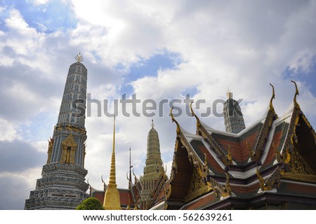 view of famous religion temple wat phra prakaew grand palace in Bangkok Thailand under a blue sky in travel and tourist destination landmark in Asia