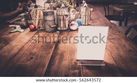 White label on the table. Stand for acrylic tent card Used for Menu Bar and restaurant or put everything into it . mockup 