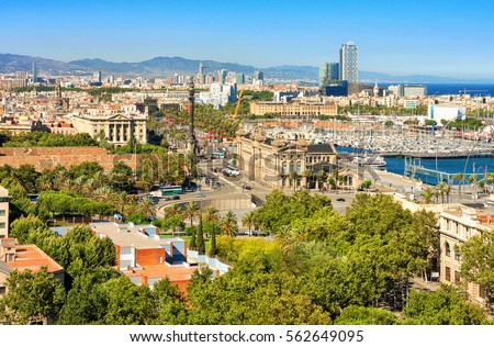 Barcelona cityscape. Aerial view seen from Montjuic hill. Barcelona port. Columbus monument.
