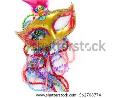 Mardi gras mask and beads on white background.Top view.