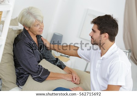picture of a senior woman and a young man