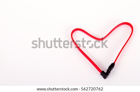 red wire folded in the shape of heart. Isolated on white