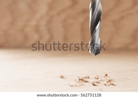 drill bit make holes in wooden oaks plank
