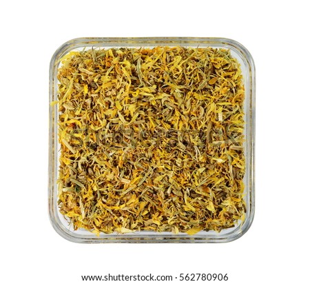  Dry marigold in a glass bowl isolated on white background.
