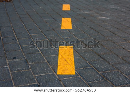 Safety street line on the pavement.