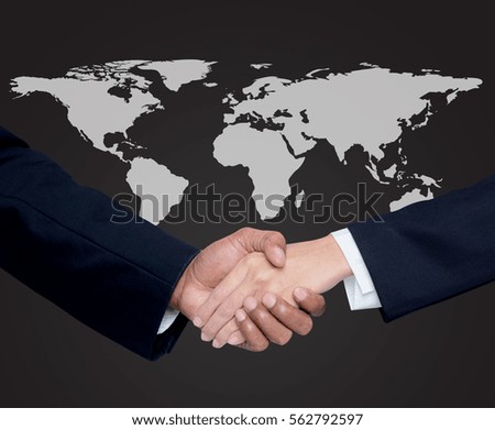 Business with people shaking hands with a global background