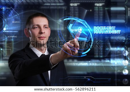 Business, Technology, Internet and network concept. Young businessman working on a virtual blackboard of the future, he sees the inscription: document management 