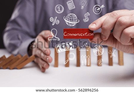 Business, Technology, Internet and network concept. Young businessman shows the word: Communication 
