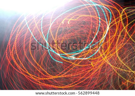Abstract motion blur messy light trail.Night lights at city abstract background