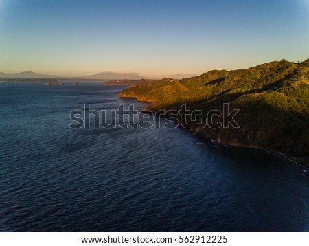 Aerial drone photo of the Pacific Ocean meeting the coastline of Costa Rica