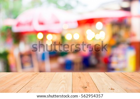 blurred image of grocery shop in the evening with beautiful bokeh from the lights
