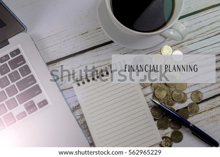 Pen,notebook,coins and coffee. General concept of business. Copy space