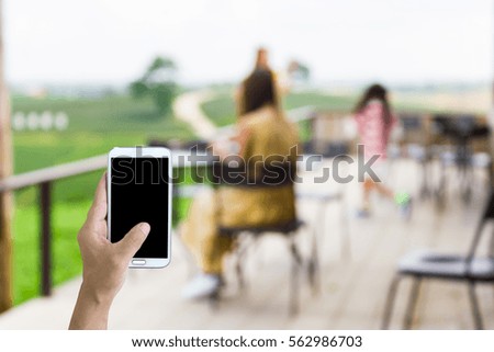 Blur image of coffee shop amidst mountain , use for background..