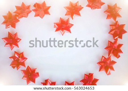 Red Silk Ribbon In Heart Shape On White Background - Stock image