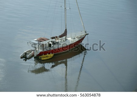 Marina dock deck boat yacht sail sun tanning city regatta lake barrage life clear blue sky                               