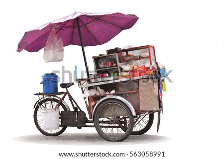Isolated cart street food with noodles cart in Thailand on white background. Royalty-Free Stock Photo #563058991
