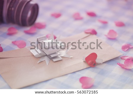 love letter and rose petals.