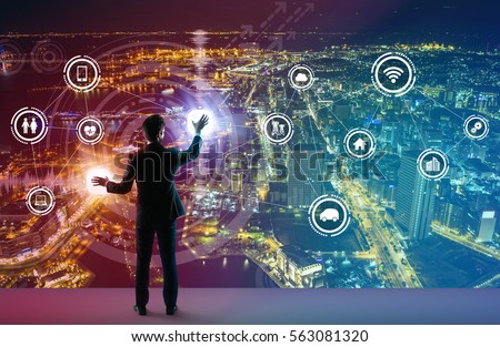 young business person and graphical user interface concept, Internet of Things, Information Communication Technology, Smart City, digital transformation, abstract image visual Royalty-Free Stock Photo #563081320