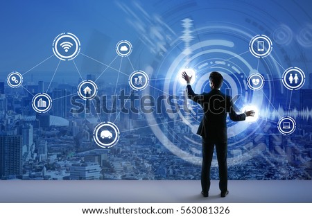 young business person and graphical user interface concept, Internet of Things, Information Communication Technology, Smart City, digital transformation, abstract image visual Royalty-Free Stock Photo #563081326