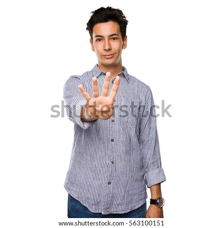 teenager doing number four gesture