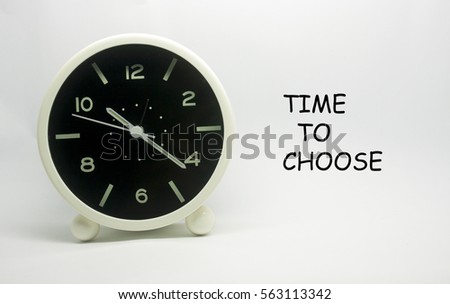 alarm clock with word time to choose concepts isolated on white background