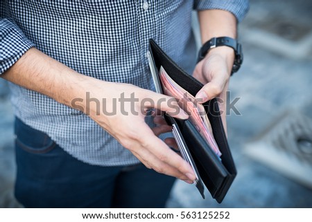 money in the wallet Royalty-Free Stock Photo #563125252
