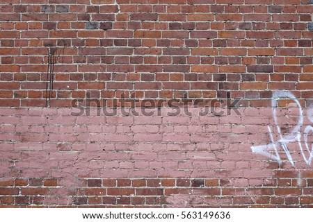 Urban Concrete Brick Wall With Painted Blank Banner Background. Graffiti Brickwall Texture With Empty Surface For Text Or Image. Outdoor Graffiti Building Wall With Copy Space