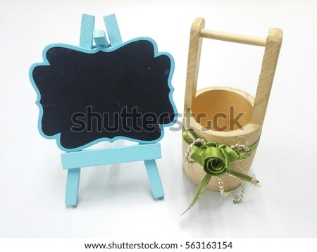 Plain chalkboard and wood basket