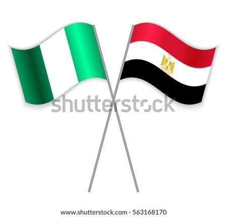 Nigerian and Egyptian crossed flags. Nigeria combined with Egypt isolated on white. Language learning, international business or travel concept.