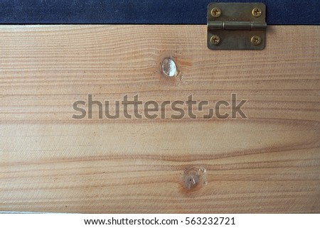 Beside the box surface of brown old retro wood, with its brass hinge free empty space texture background.