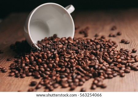 Black coffee beans scattered
