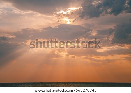 Sea Sunset with clouds Royalty-Free Stock Photo #563270743
