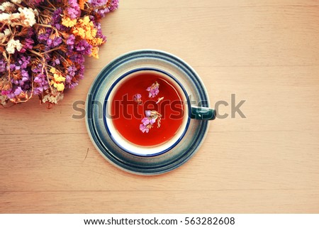 Top view of cup herbal tea drink with lavender flowers. 