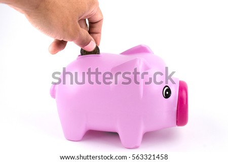 Pink piggy bank isolated on white.