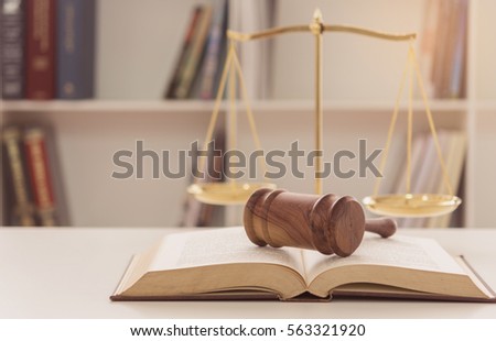 Legal,Law,Legislation Concept. Judge gavel on law books with scales of justice. 