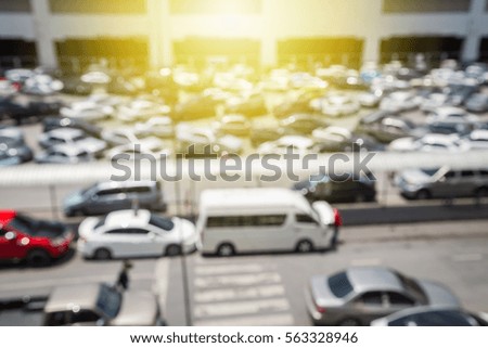 Vintage blur of car at public car parking background