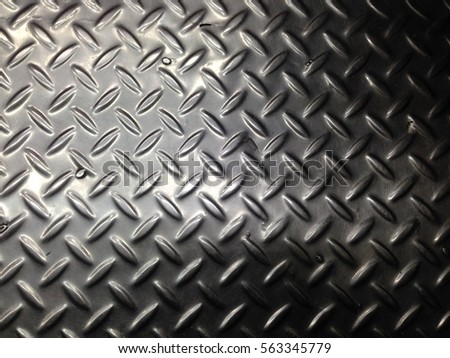 The surface of the metal or stainless steel.