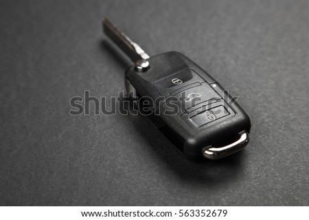 Car key on dark background