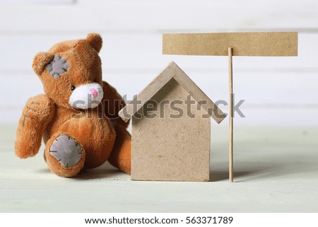 toy house and sign board